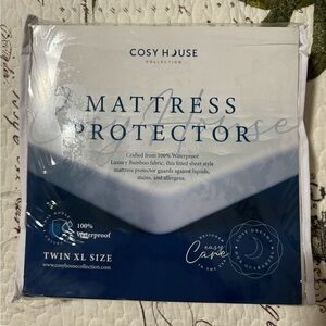 twin XL Mattress Protector waterproof New in package. Cosy House.